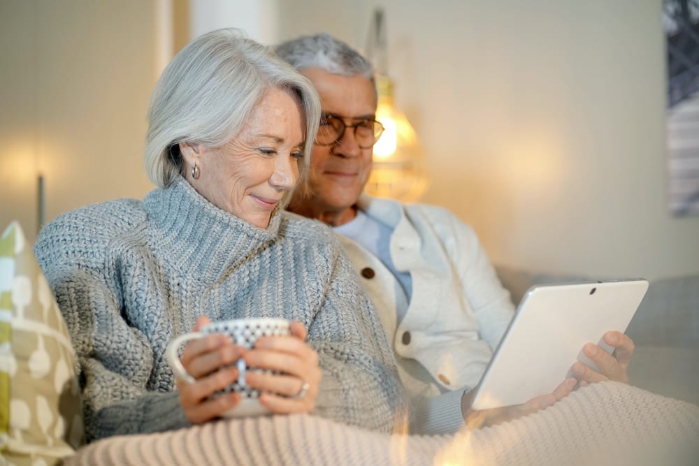elderly couple reading